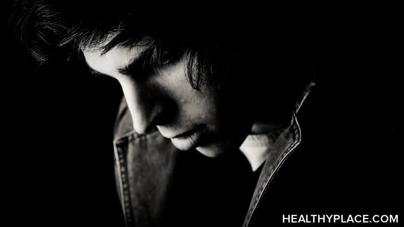 Depression Treatment in Bhopal sad man looking down feeling hopeless emotional pain mental health support Serenity Neuropsychiatry Clinic
